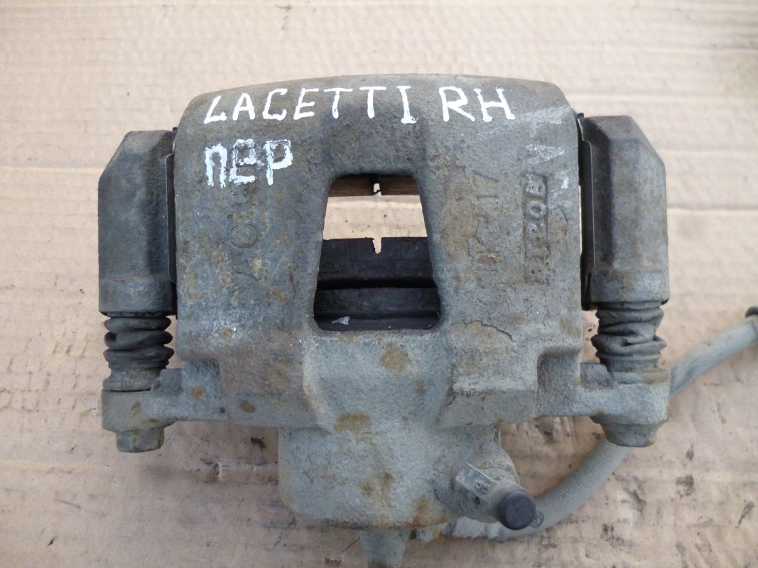 суппорт передний шевроле лачетти 2008. шевроле лачетти передний суппорт тормозной 1. суппорт на chevrolet lacetti combo. передний правый суппорт лач. задний суппорт лачетти.